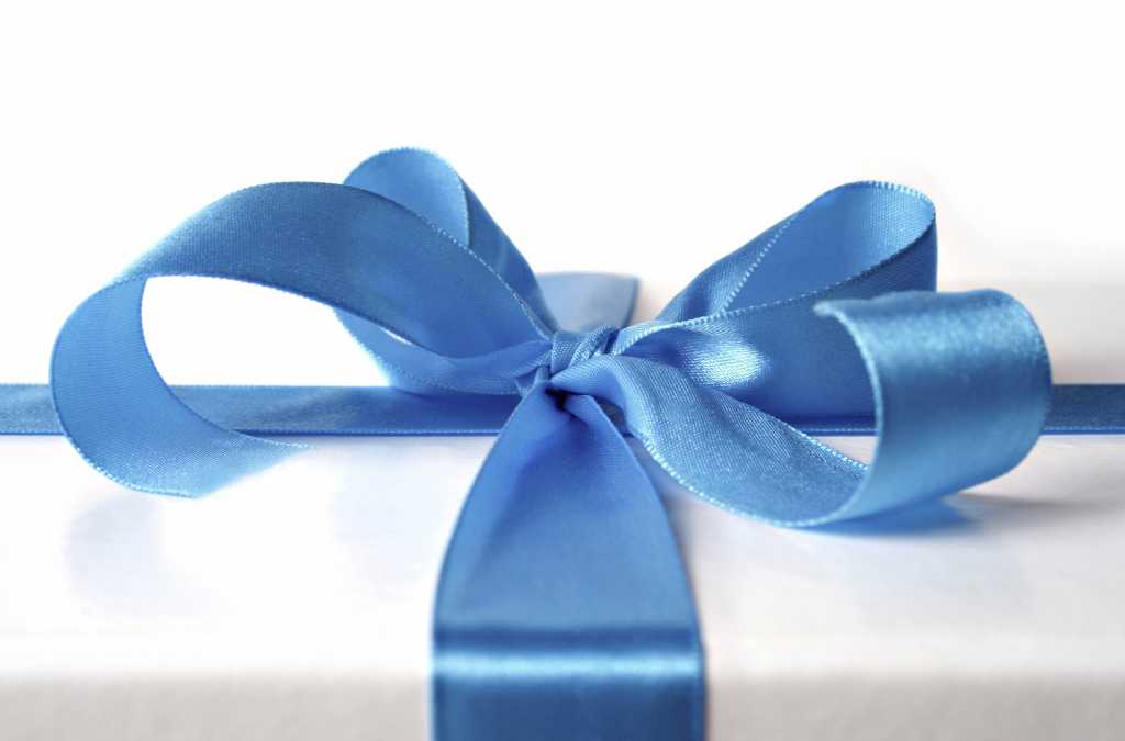 white gift box with blue ribbon